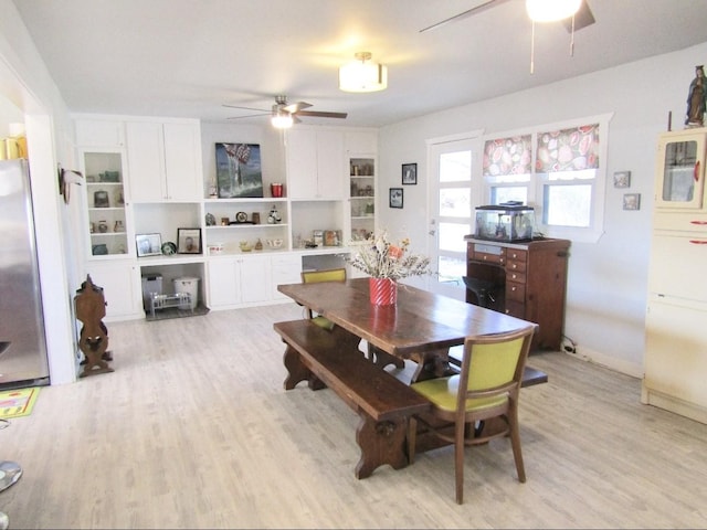 dining room featuring ceiling fan and light wood-type flooring