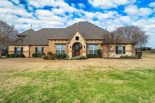 view of front of property with a front lawn