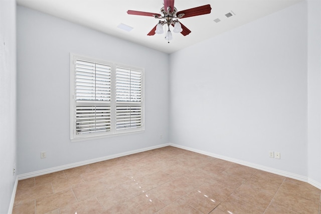 unfurnished room with ceiling fan