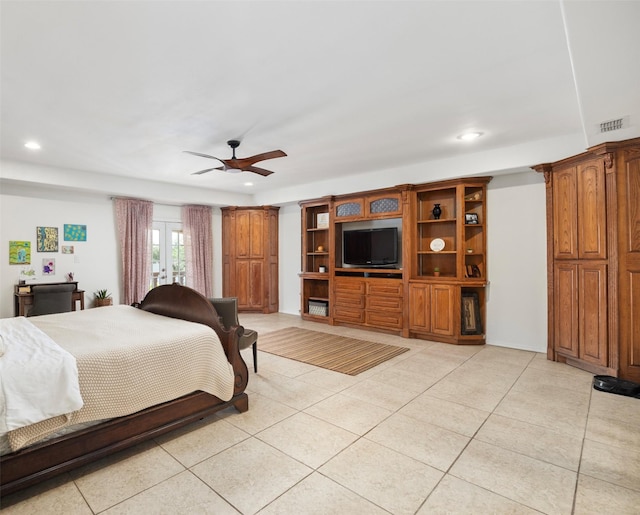 tiled bedroom with ceiling fan