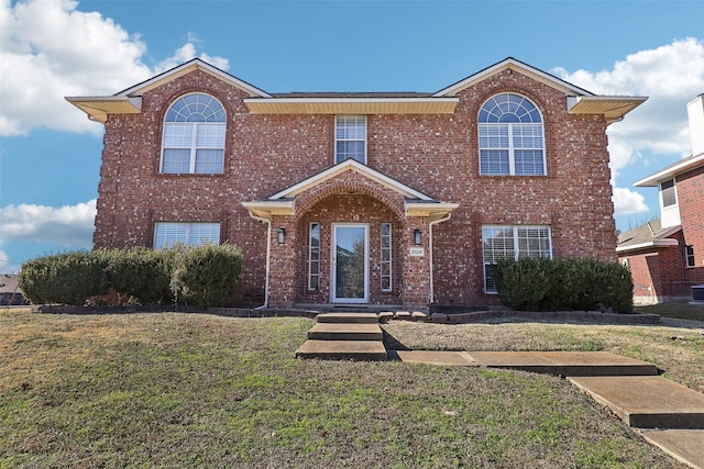 view of front property featuring a front yard