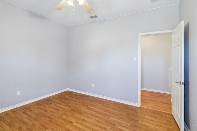 unfurnished room with ceiling fan and light hardwood / wood-style flooring