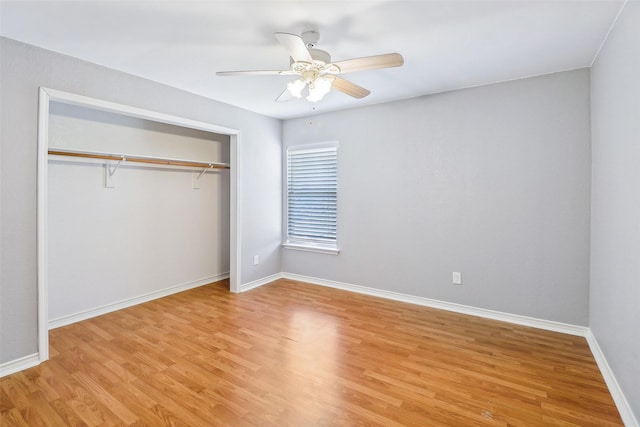 unfurnished bedroom with a closet, ceiling fan, and light hardwood / wood-style floors