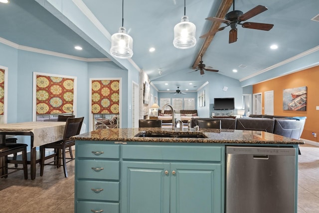 kitchen with sink, vaulted ceiling with beams, stainless steel dishwasher, an island with sink, and pendant lighting