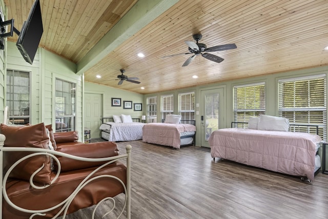 bedroom featuring wood ceiling, ceiling fan, wooden walls, wood-type flooring, and lofted ceiling with beams