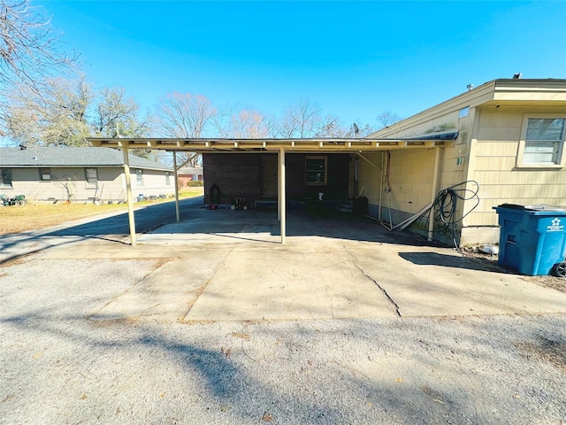 exterior space featuring a carport