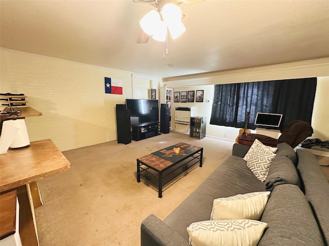 living room featuring ceiling fan and light colored carpet