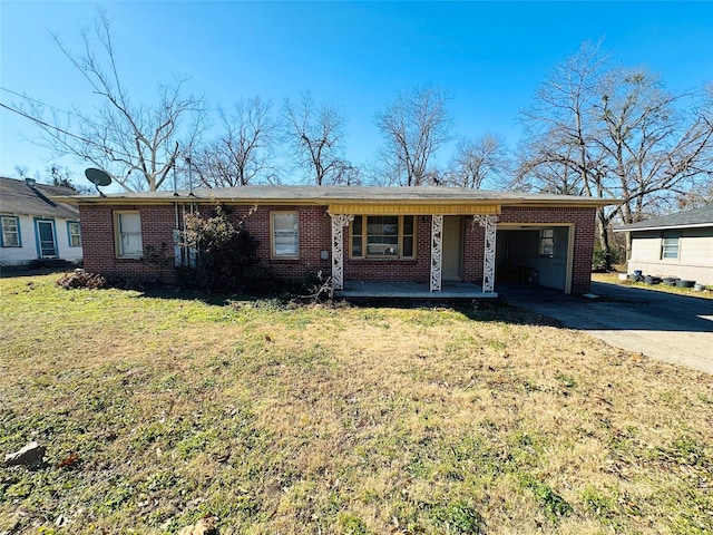 ranch-style house with covered porch and a front lawn