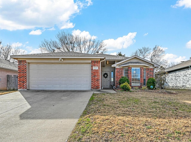 ranch-style home with a garage and a front lawn