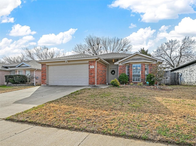 ranch-style house featuring a garage and a front yard