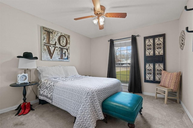 bedroom featuring ceiling fan and carpet floors