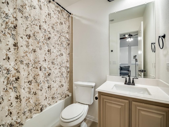 full bathroom featuring vanity, shower / tub combo, toilet, and ceiling fan