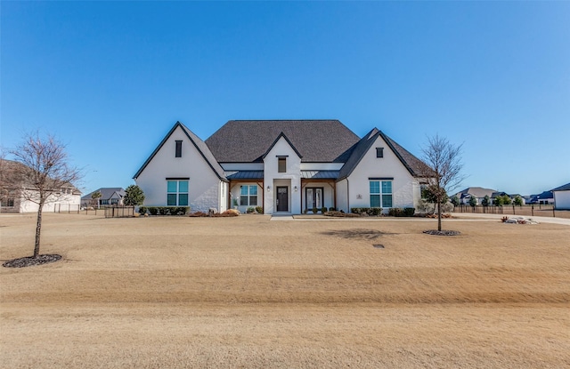 view of front of property with a front lawn