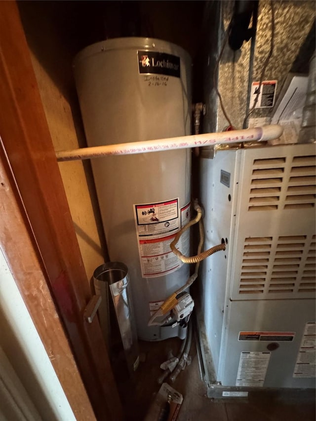 utilities featuring water heater and heating unit