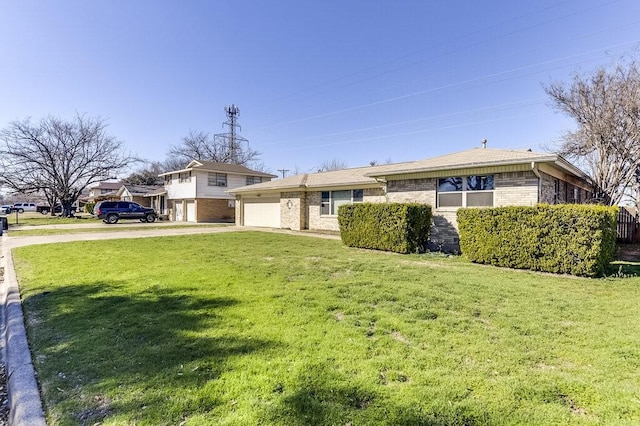 view of front of house featuring a garage, concrete driveway, brick siding, and a front lawn