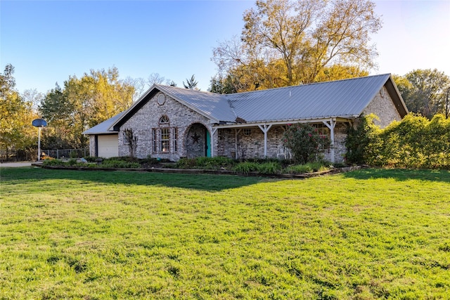 ranch-style home with a front lawn