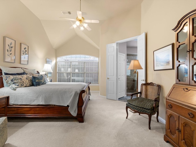 bedroom with high vaulted ceiling, light colored carpet, and ceiling fan