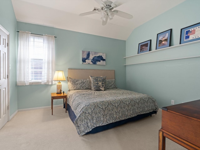 bedroom featuring lofted ceiling, carpet flooring, and ceiling fan