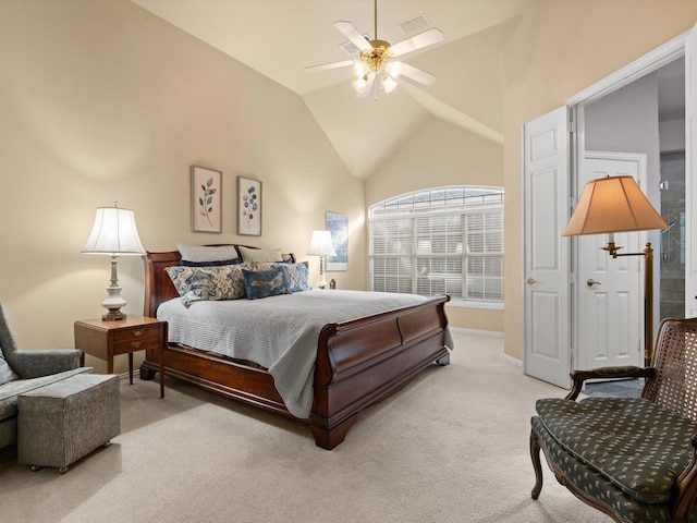 carpeted bedroom with ceiling fan and lofted ceiling