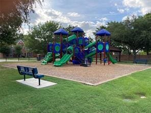 view of playground featuring a lawn