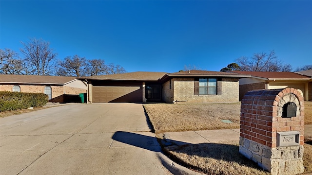 ranch-style house with a garage