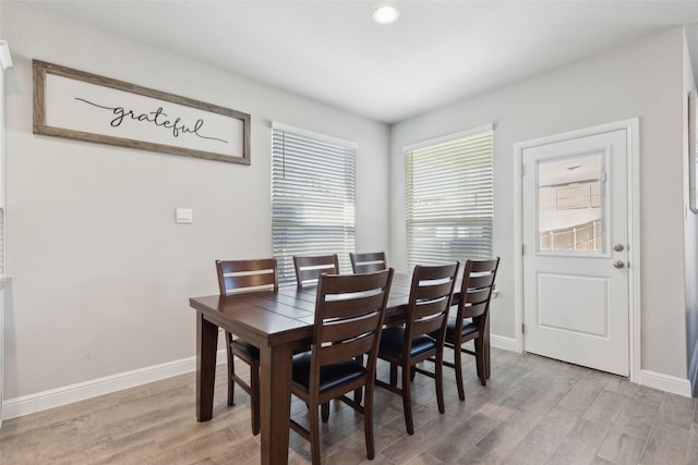 dining area featuring hardwood / wood-style floors