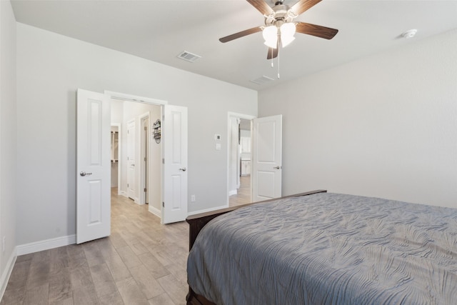 bedroom featuring ceiling fan and light hardwood / wood-style floors