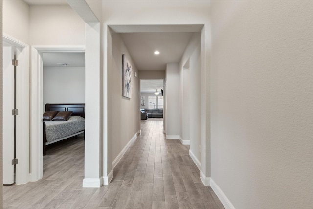 hall featuring light hardwood / wood-style floors