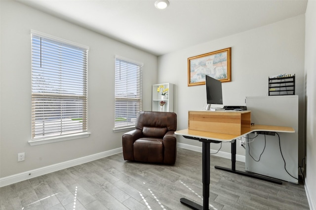 home office featuring light hardwood / wood-style floors