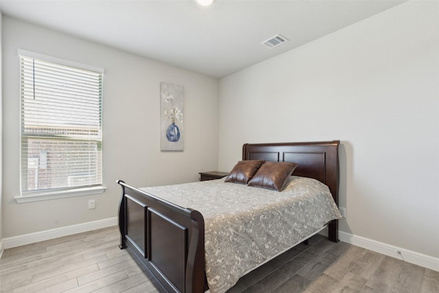 bedroom featuring light hardwood / wood-style flooring