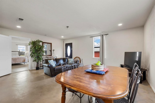 dining area featuring plenty of natural light