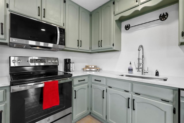 kitchen featuring stainless steel appliances and sink