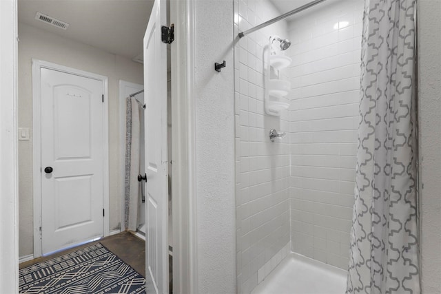 bathroom with a shower with curtain