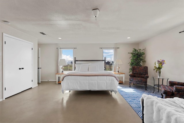 bedroom featuring a textured ceiling