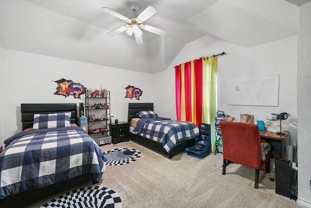 bedroom featuring lofted ceiling, carpet floors, and ceiling fan