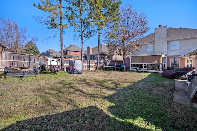 view of yard featuring a trampoline