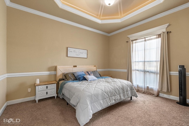 bedroom featuring crown molding, a raised ceiling, and carpet floors