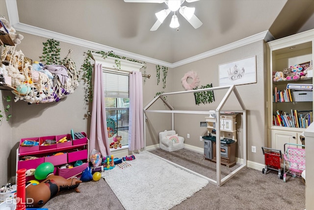 rec room featuring ornamental molding, carpet, and ceiling fan