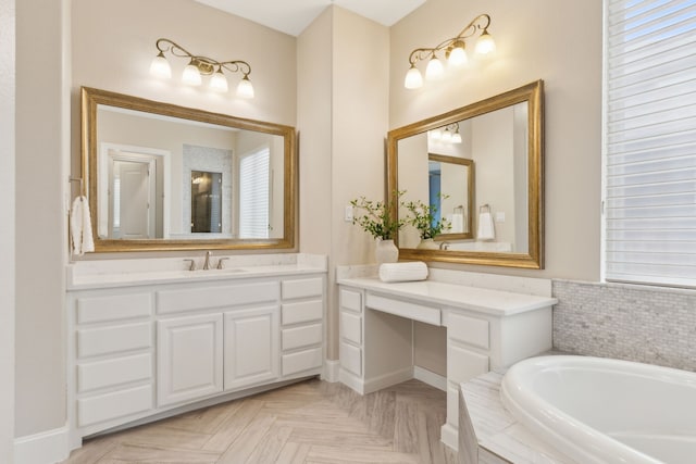 bathroom featuring vanity, parquet floors, and a relaxing tiled tub