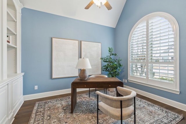 office space featuring lofted ceiling, dark hardwood / wood-style floors, and ceiling fan