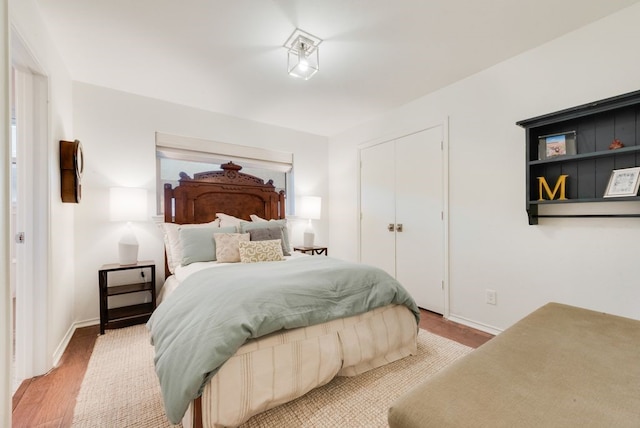 bedroom with light wood-type flooring