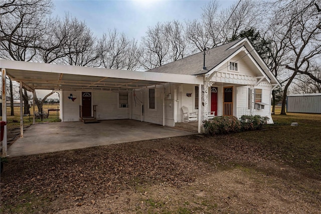 view of front facade with a carport