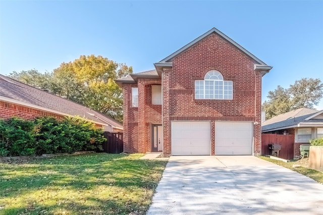 view of property featuring a garage and a front lawn