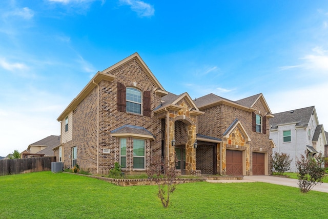 front facade with central AC, a garage, and a front lawn