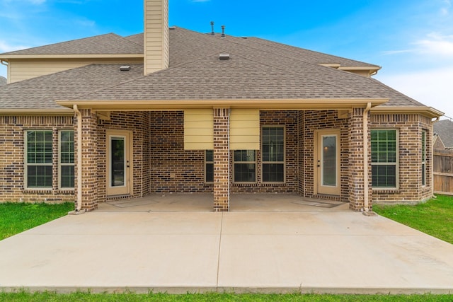 rear view of house with a patio area