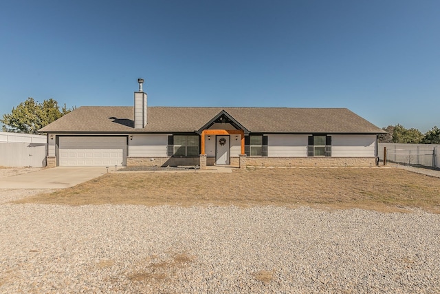 single story home featuring a garage