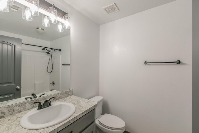 full bathroom with visible vents, vanity, toilet, and shower / bathtub combination