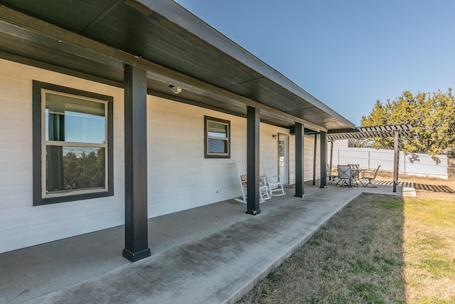 view of patio / terrace featuring a pergola