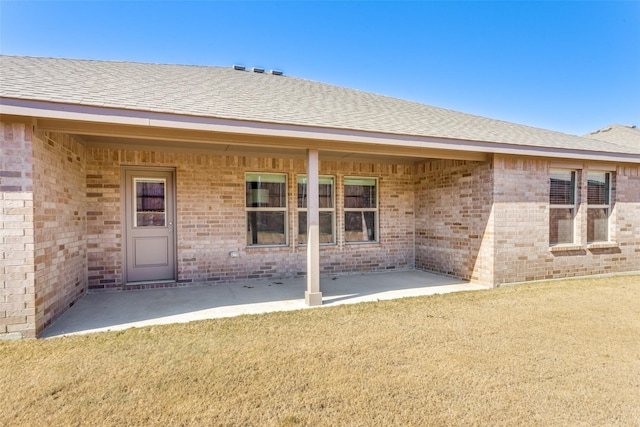 rear view of house featuring a patio