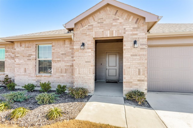 entrance to property with a garage